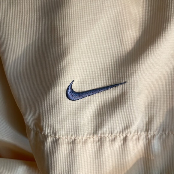 Nike Golf pullover. Yellow w/slate blue trim. It has front pockets that zip. - Picture 7 of 7